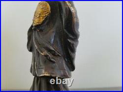 A Chinese Qing Brass Zhuge Liang Figure with Black Finish